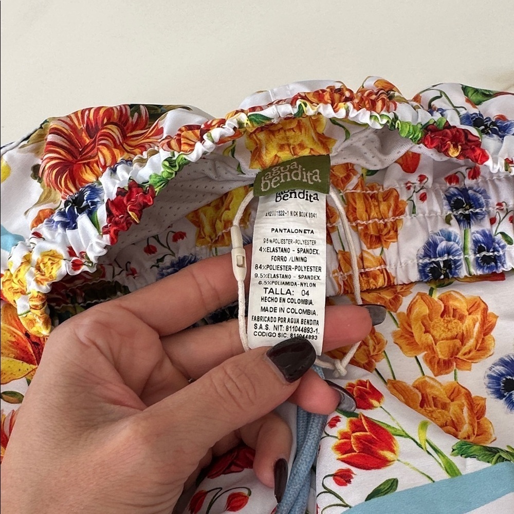 Agua Bendita Floral Swim Shorts with Orange Trim - Picture 4 of 5